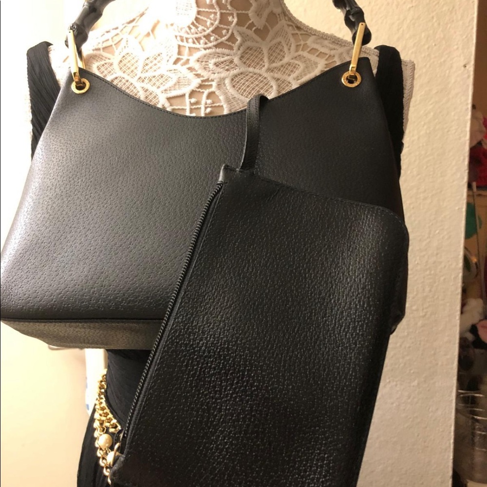 Gucci Bamboo, black with pouch very little scratch but invisible.